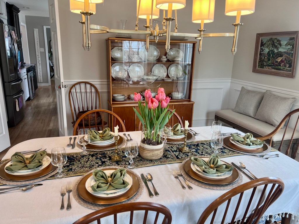 St. Patrick’s Day dining table set with Schleiger 79 china and matching pieces displayed in a china cabinet