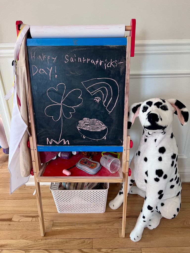 Kids chalkboard sign with Happy St. Patrick’s Day message written on it