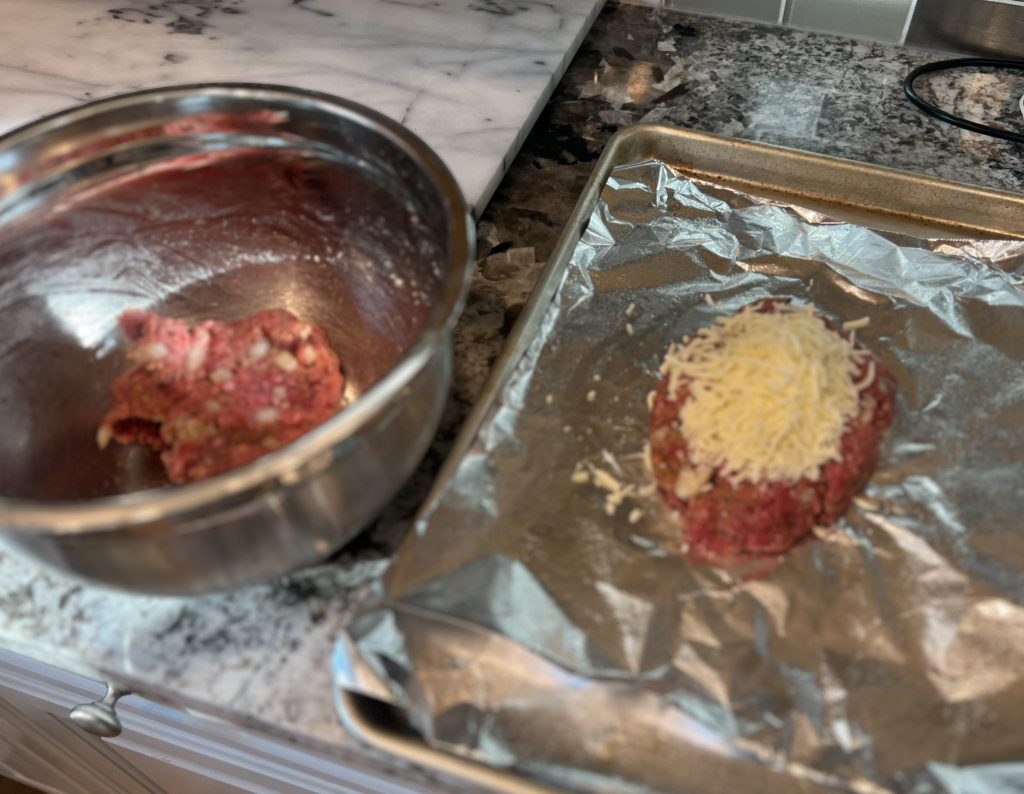 Adding shredded mozzarella to ground beef mixture for mozzarella stuffed meatloaf
